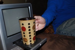 Jim found it to be ther perfect cup holder.  No coasters needed around here!